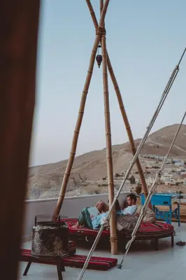 two children playing on a pirate shipousel at Nomads Hotel in Wadi Musa