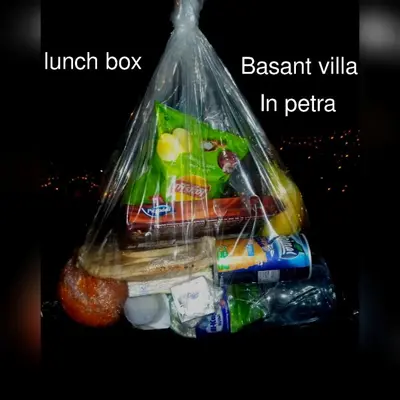 a plastic bag filled with different types of food at Basant Villa in Wadi Musa