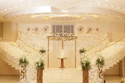 a wedding hall with stairs and a altar at Opal Hotel Amman in Amman