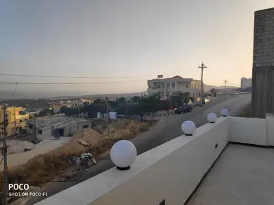 a view of a street from the roof of a building at The Pearl of Jerash in Jerash