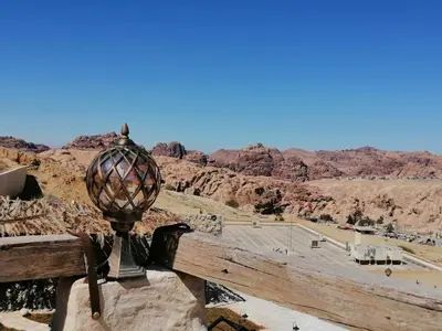 a view of the desert from the top of a mountain at Infinity Lodge in Wadi Musa