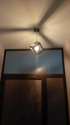 a light hanging above a door in a room at Bubble castle in Kerak