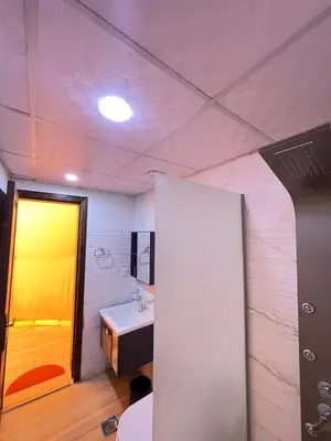 a bathroom with a sink and a mirror at Wadi Rum Mars Camp in Wadi Rum