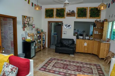 a living room with a couch and a chair at Hakaia Community in Aqaba