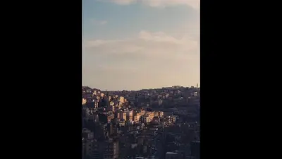 a view of a city from the top of a building at Superior Executive Apartment in Umm Uthainah