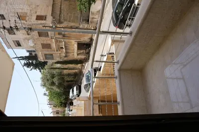 a view from a window of a building at Amazing one Bedroom Apartment in Amman Elwebdah 7 in Amman