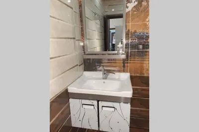 a bathroom with a sink and a mirror at moon valley site jerash in Jerash