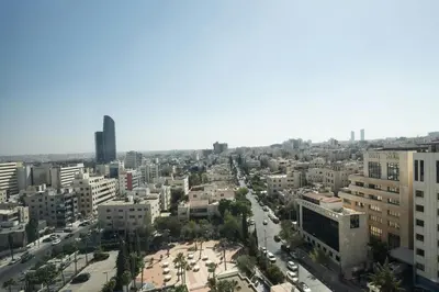 an aerial view of a city with buildings at Amman Marriott Hotel in Amman