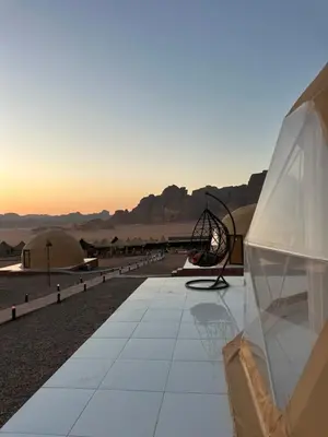 a view of the desert from a building at Bubbles Desert Camp Jeep Tours in Wadi Rum