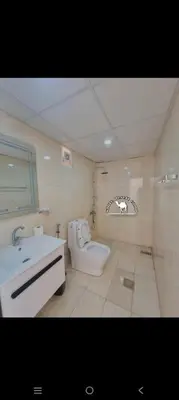 a bathroom with a sink and a toilet in it at White Desert Camp in Wadi Rum