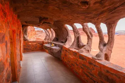 a view of a room with a view of a desert at Wadi Rum Cave Camping in Wadi Rum