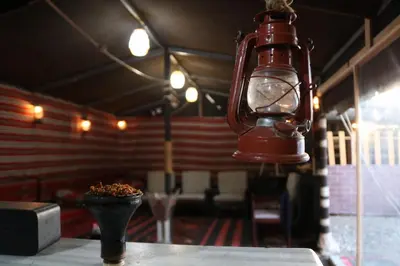 a red lantern hanging from the ceiling of a restaurant at VALUE PLACE in Wadi Musa