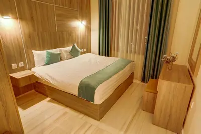 a bedroom with a bed in a room at Turquoise Hotel in Aqaba