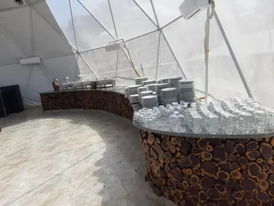 a large tent with a bunch of water bottles at The Rock Camp Petra in Wadi Musa