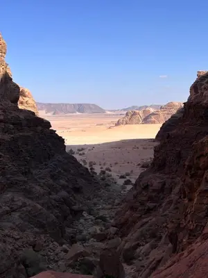a view of the desert from a canyon at Bedouin Desert Life Camp & Jeep Tours in Wadi Rum