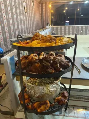 a display of different types of food on a shelf at Wadi rum under stars in Wadi Rum