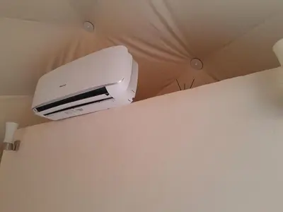 a printer on the ceiling of a room at Aun Wadi Rum Camp in Wadi Rum