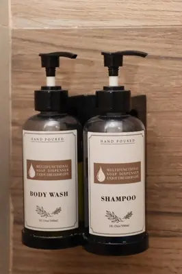 two bottles of soap sitting next to each other at ALENA HOTEL in Aqaba
