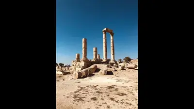 an ancient temple with columns in the desert at The Royal Luxury Superior Queen cot in Amman