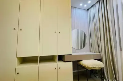 a dressing room with a desk and a mirror at Maria Beach Ground Floor Apartament in Aqaba