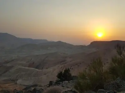 a view of the desert at sunset at Dana Sunset Eco Camp in Dana