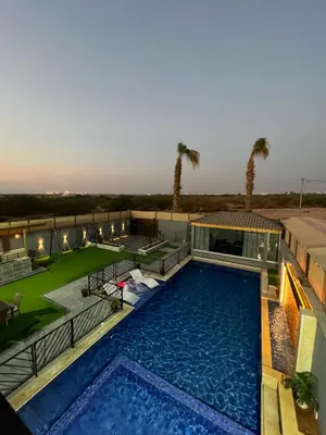 an overhead view of a swimming pool on a building at Aroma Mountain Dead Sea in Sowayma