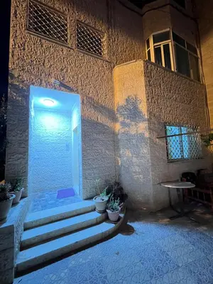 a room with stairs and a door in a building at Petra luxurious view house in Wadi Musa