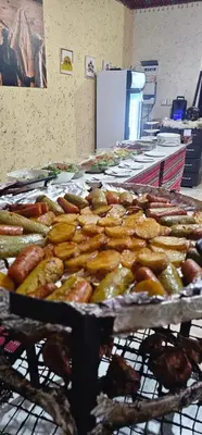 a bunch of trays of food on a table at Ammar Rum Camp and tours in Wadi Rum