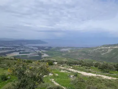 a view of a valley from the top of a hill at شقة سيلا in Irbid
