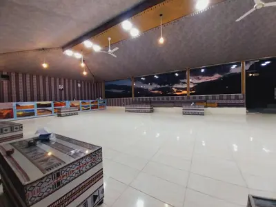 a large room with a skating rink in a building at Star rum in Wadi Rum
