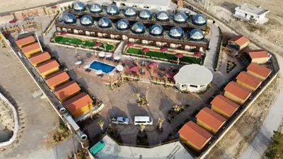 an overhead view of a building with domes at Petra Seasons luxury Resort in Al Ḩayy