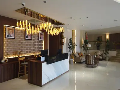 a lobby of a hotel with a reception desk at H Luxury Hotel in Wadi Musa