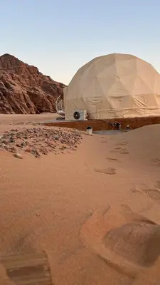 a tent in the middle of a desert at Rum New Luxury Camp in Wadi Rum