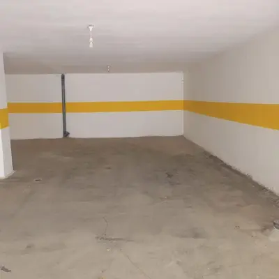 an empty room with yellow and white stripes on the wall at Exquisite & inviting 2 Bedroom 2 bath Balcony Fast internet in Amman