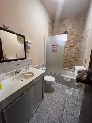 a bathroom with a sink and a toilet at Petra fort hotel in Wadi Musa