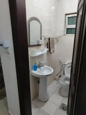 a bathroom with a sink and a toilet at شقه مفروشة الجبيهه in Amman