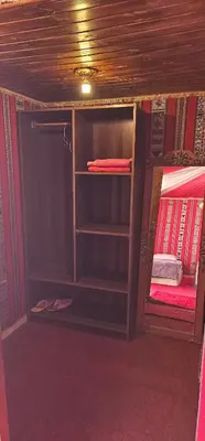 a room with a closet with two bunk beds at Rum Darien Camp in Wadi Rum