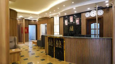 a lobby with a reception desk in a building at Sorate Hotel Apartment in Amman
